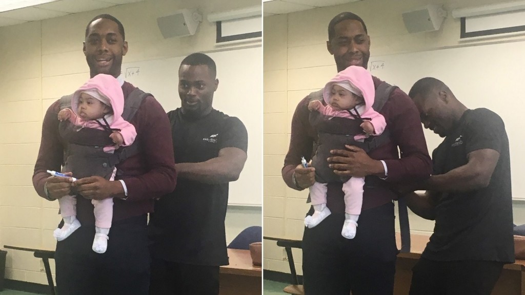 Professor holds baby during class after dad can’t find babysitter