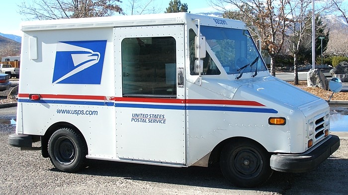 USPS worker charged with theft