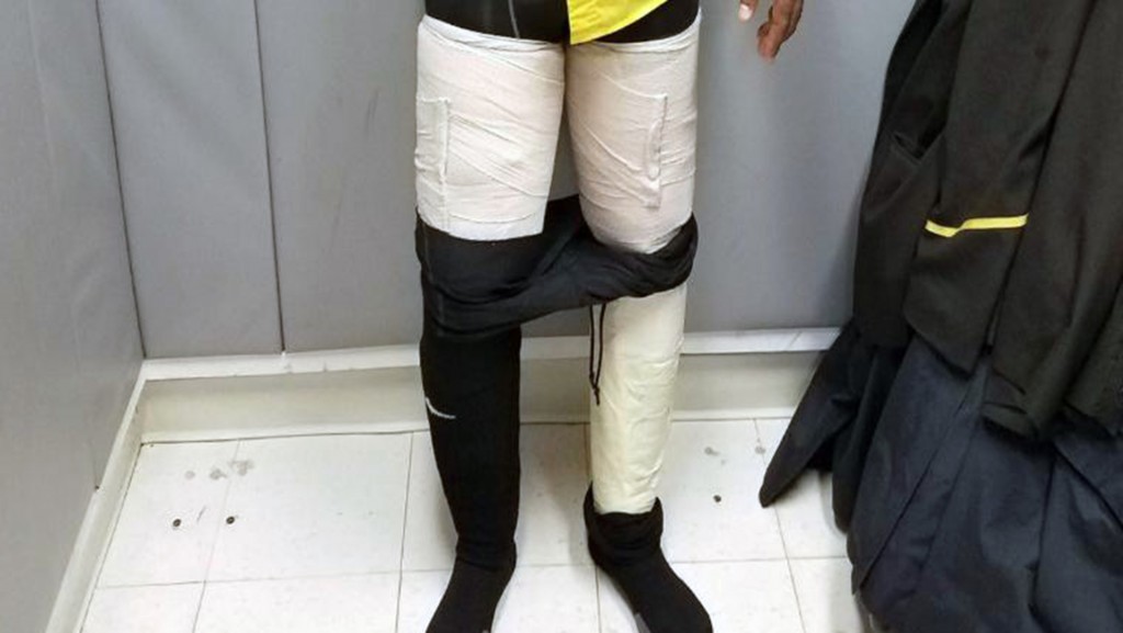 Airline worker busted with 9 pounds of cocaine taped to legs