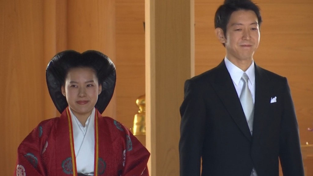 Japan’s Princess Ayako surrenders royal status as she marries for love