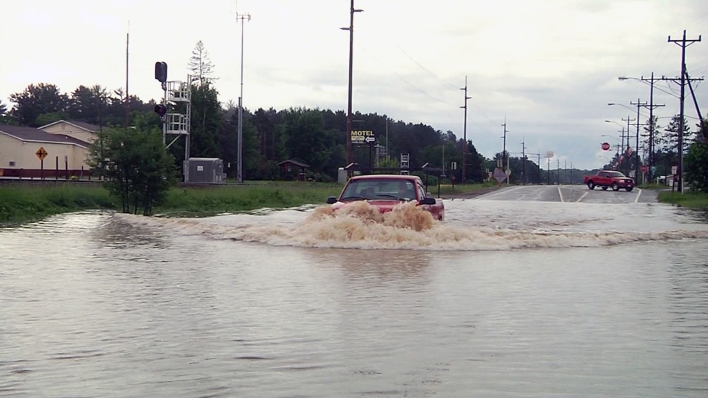 Floods wipe out roads, businesses in Michigan, Wisconsin