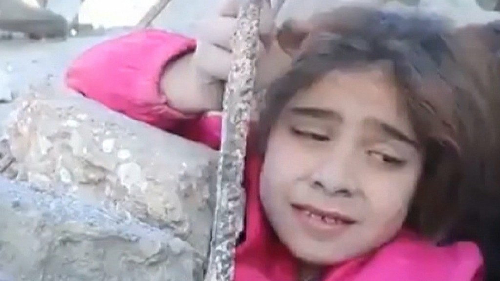 Dramatic video shows Syrian girl being rescued in middle of airstrike