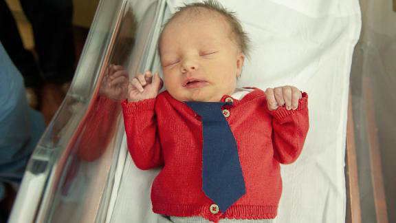 Pittsburgh hospital babies dressed as Mister Rogers for Cardigan Day