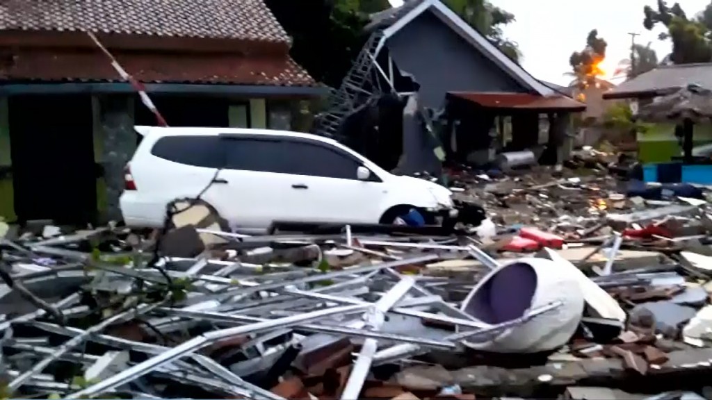 At least 168 killed when tsunami hits beaches in Indonesia