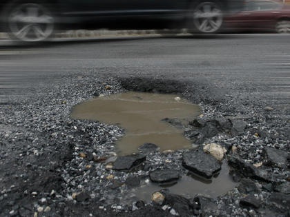 You can now report Spokane potholes online