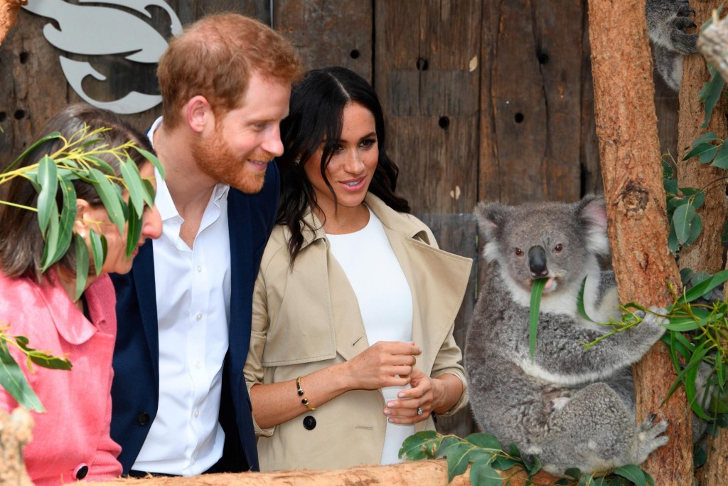 Parents-to-be Meghan and Harry kick off Australia tour with baby gifts