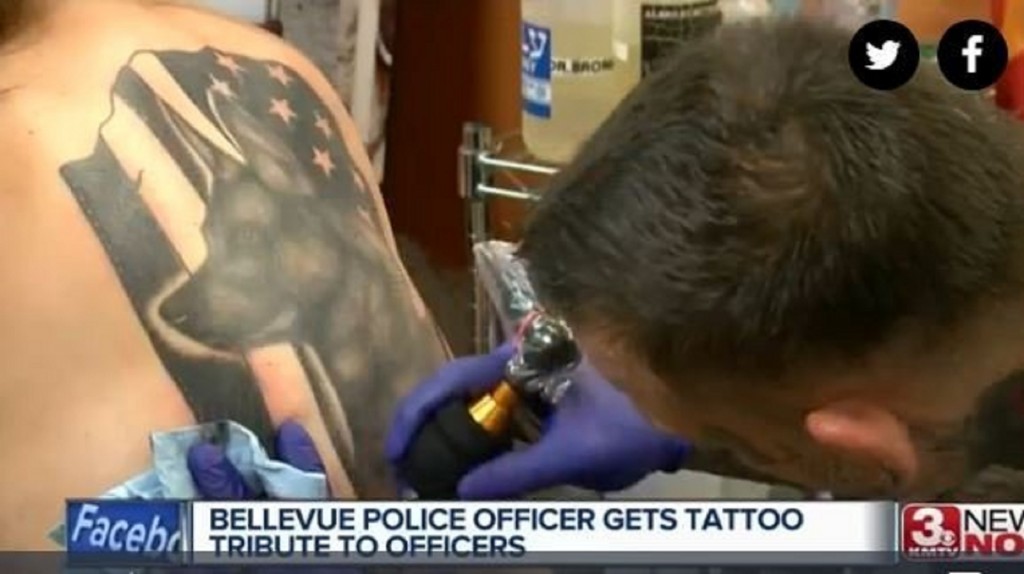 Police officer gets tattoo of K-9 colleague