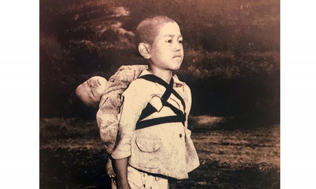 ‘The fruit of war’: Pope Francis prints photo of Nagasaki victims
