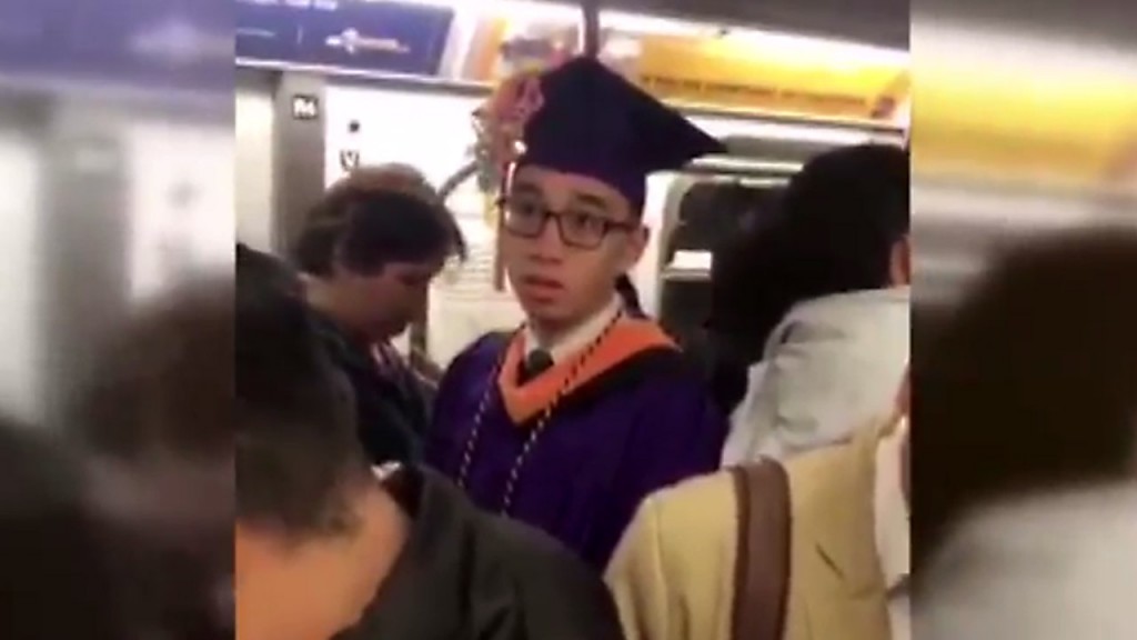 Subway delays lead one college graduate to celebrate commencement on train