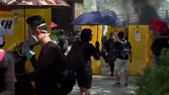 Protesters try to escape Hong Kong university after clashes