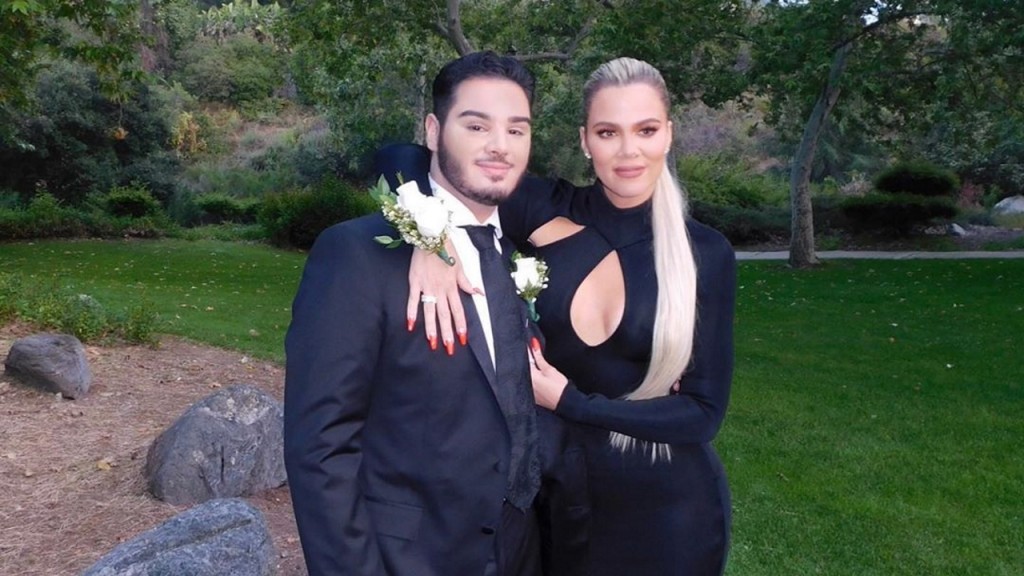 Khloe Kardashian attends her first prom with a fan