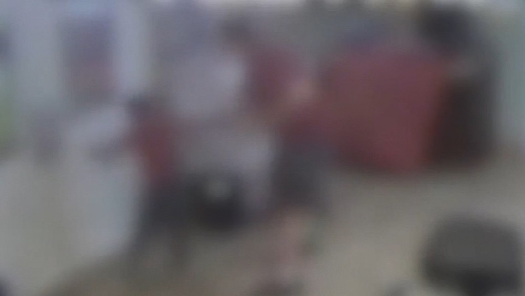 Videos show shelter staffers pushing, shoving migrant children