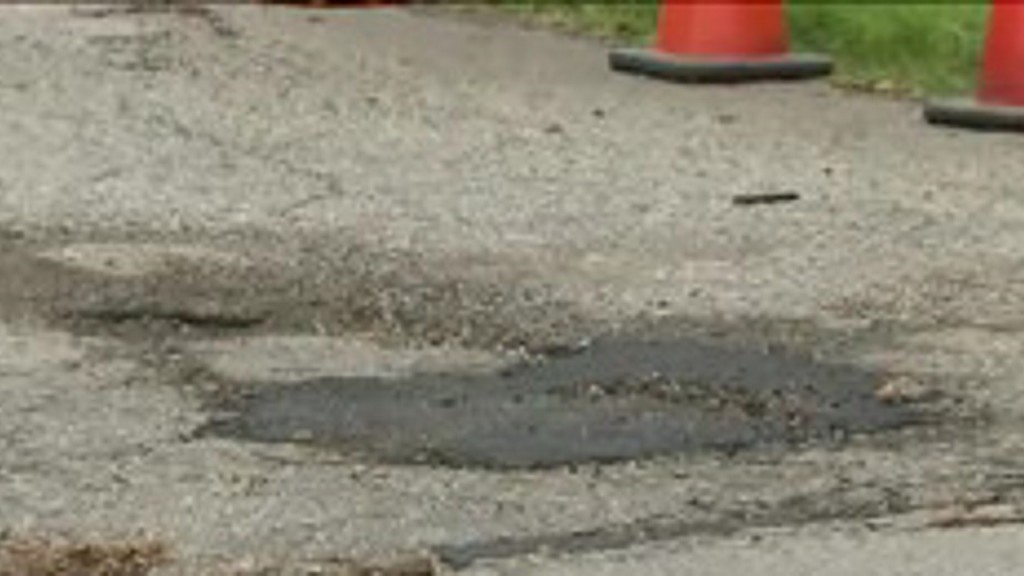Man who threw party for pothole celebrates after it is fixed