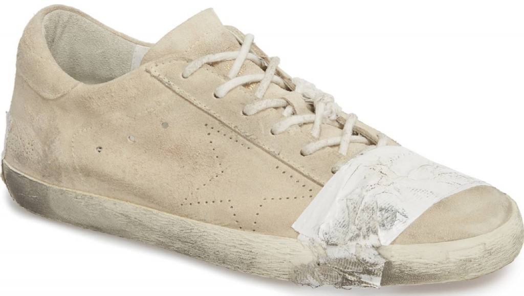 Grungy, taped-up designer sneakers sell for $530