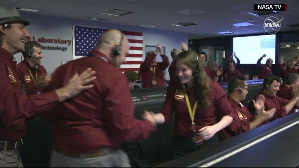 Epic NASA handshake inspired by NFL players