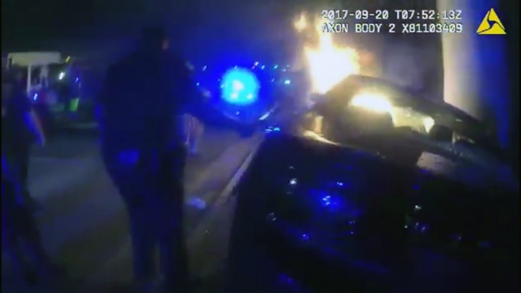 Police body cam video shows rescue from life-threatening car fire