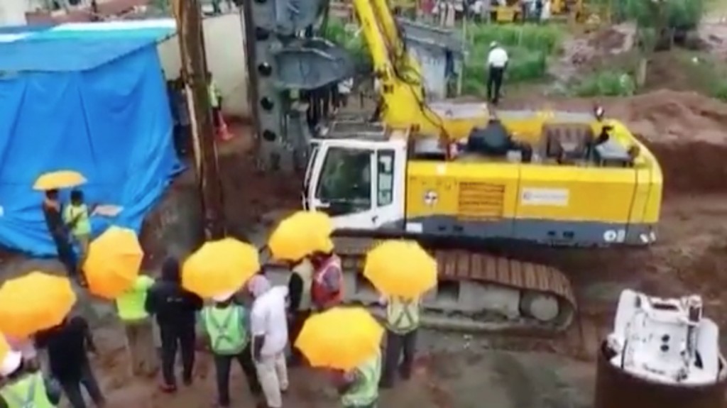 Rescuers race to save toddler trapped in 88-foot well in India