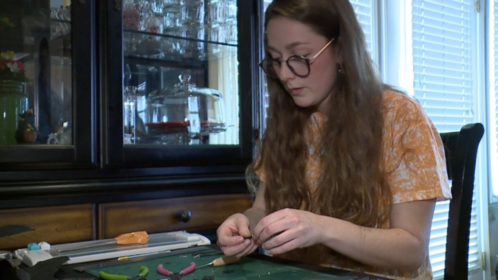 Graphic designer makes jewelry from tornado debris to help others
