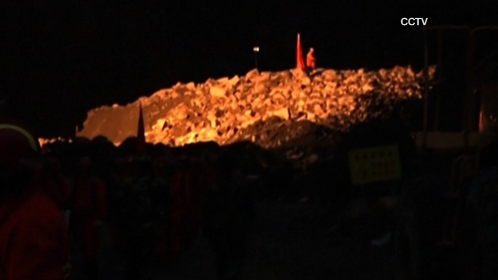 China landslide: Desperate search for survivors continues