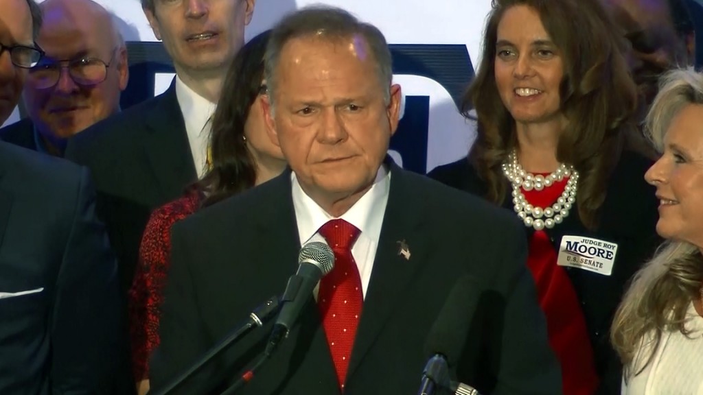 Roy Moore church event interrupted by protester, comedian