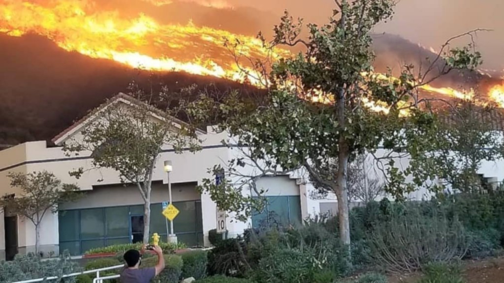 Wind-driven fires rip through California