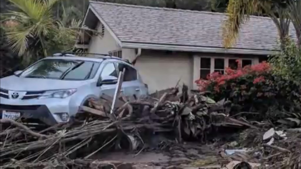 Flooding, mudslides and snow hit California roads