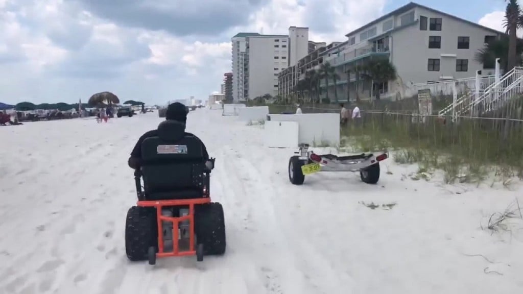 Special wheelchair helps man live beach dream