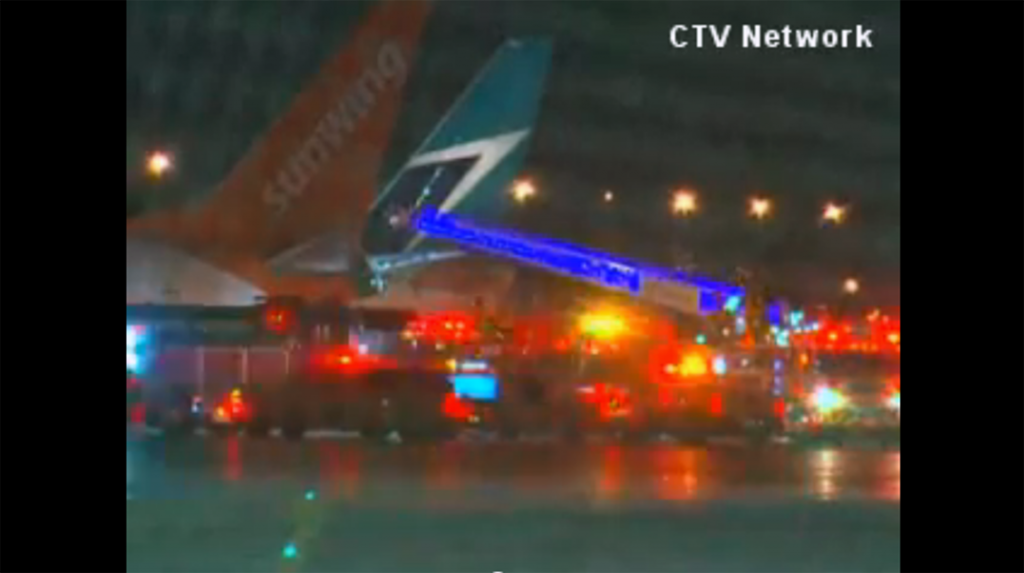 Planes collide on Toronto airport tarmac; fire prompts evacuation