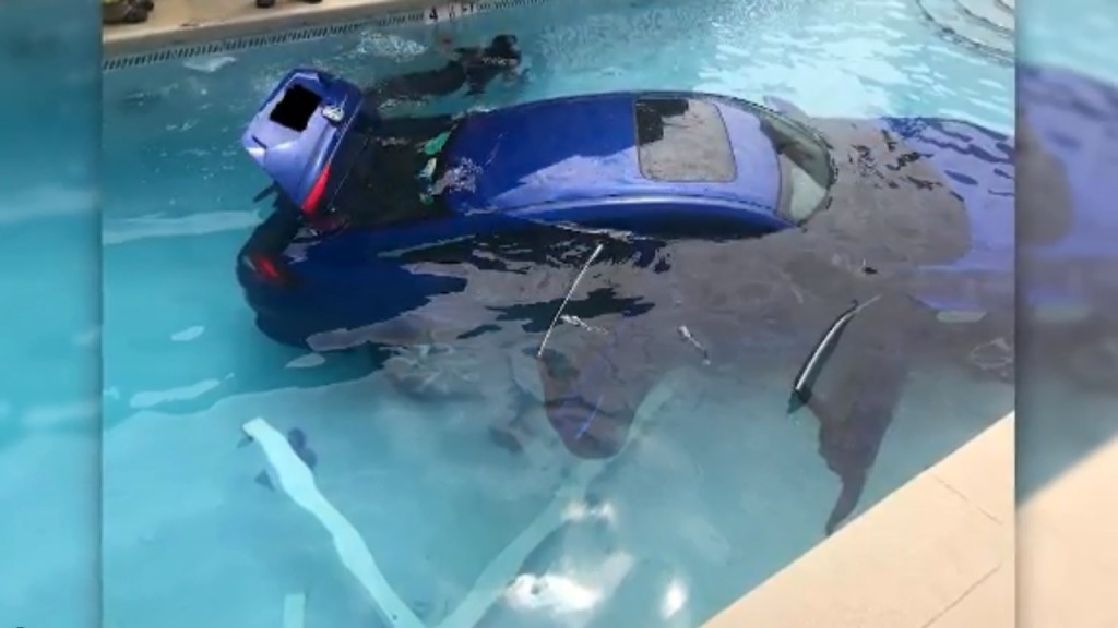 Woman’s car rolls into pool after she forgets to put it in park