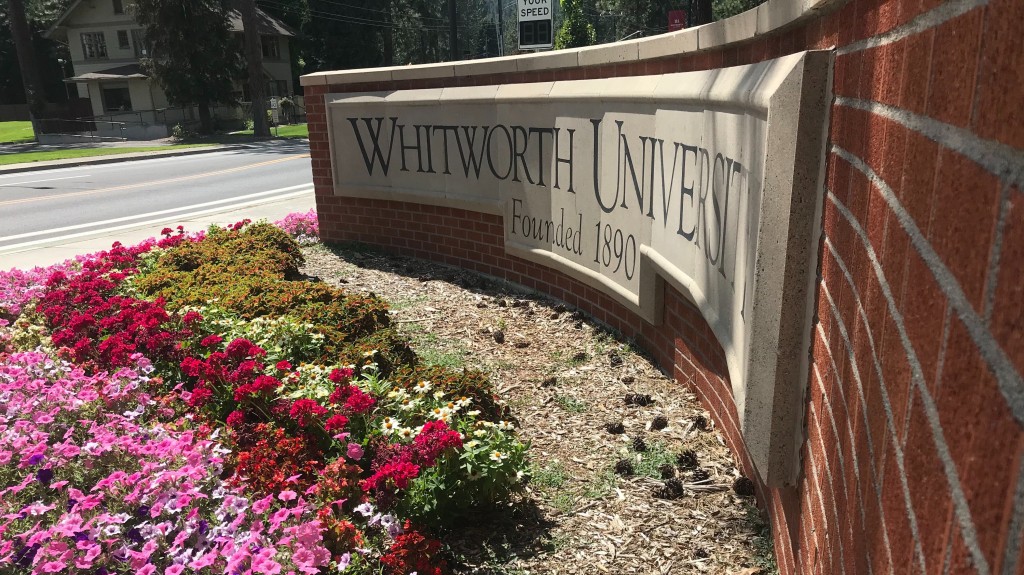Whitworth Sign With Flowers