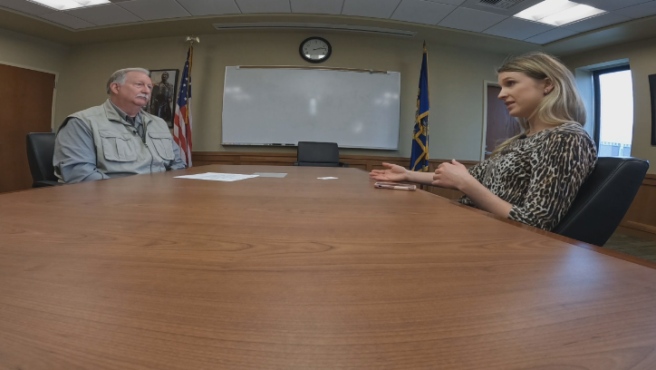 Emily Blume talking with U.S. Marshal Craig Thayer.