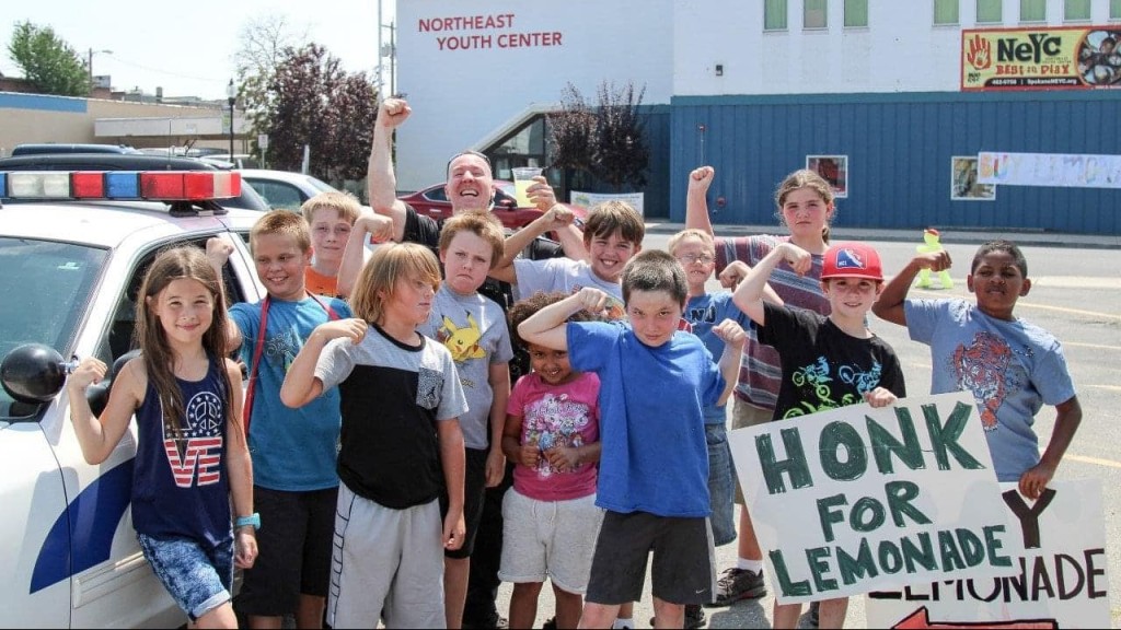 Kids at the Northeast Youth Center sell lemonade to raise money for end-of-summer trip