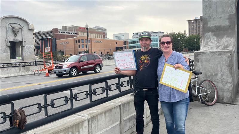 People meet on Monroe Street Bridge for Suicide Prevention Month