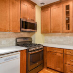 16 Open Kitchen From Dining Room Beautifully Updated And Modernized With New Quartz Counters Cabinets 701 S Braddock 8