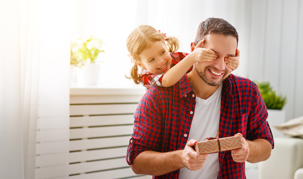 Father's,day.,happy,family,daughter,hugging,dad,and,laughs,on