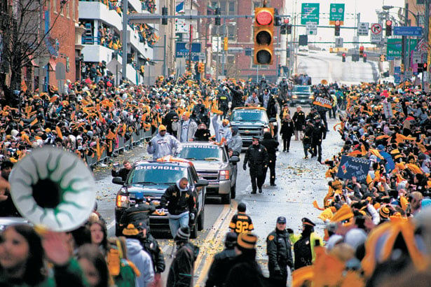 Thousands of Steelers crowd around the players as the Super Bowl XL  champion Pittsburgh Steelers celebrate in a parade down Fifth avenue in  Pittsburgh, Pa., on February 7, 2006. The Steelers defeated