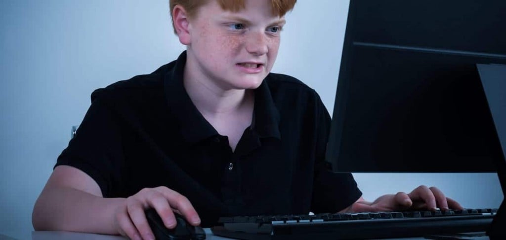 Angry Boy On Computer