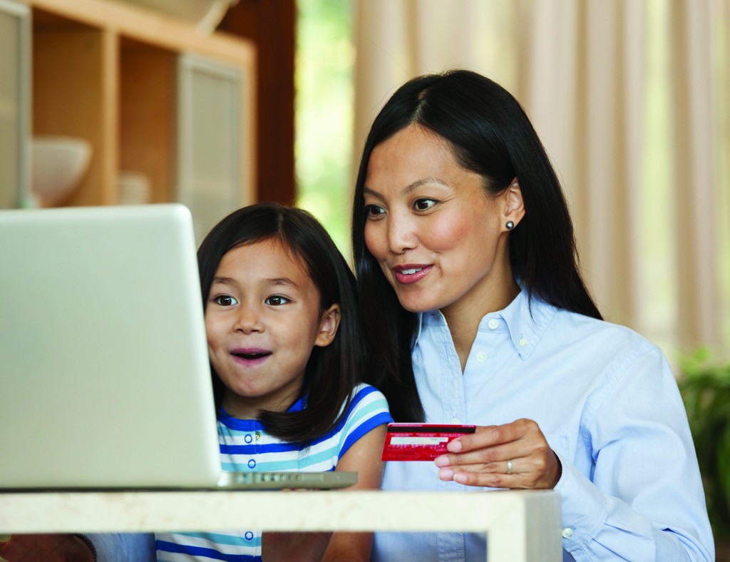 mother and daughter shopping online