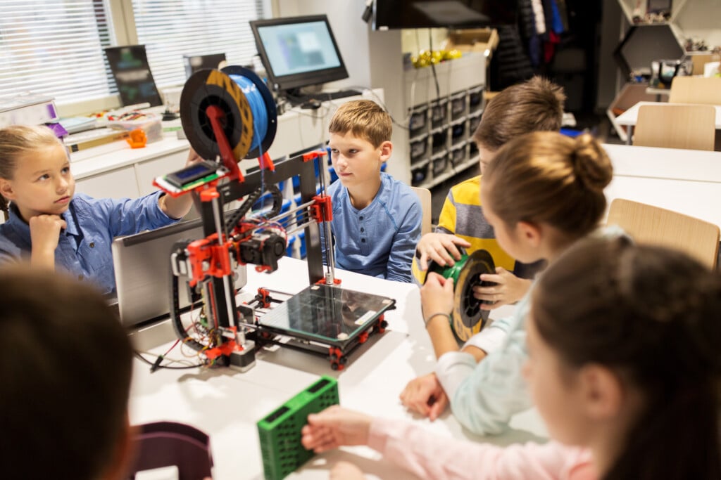 Happy Children With 3d Printer At Robotics School