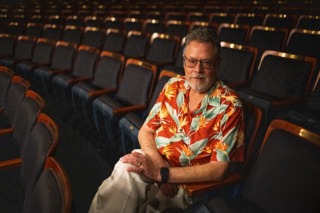 Richard Lewis Sitting with his legs crossed in the Broadway Sacramento venue of the Safe PAC