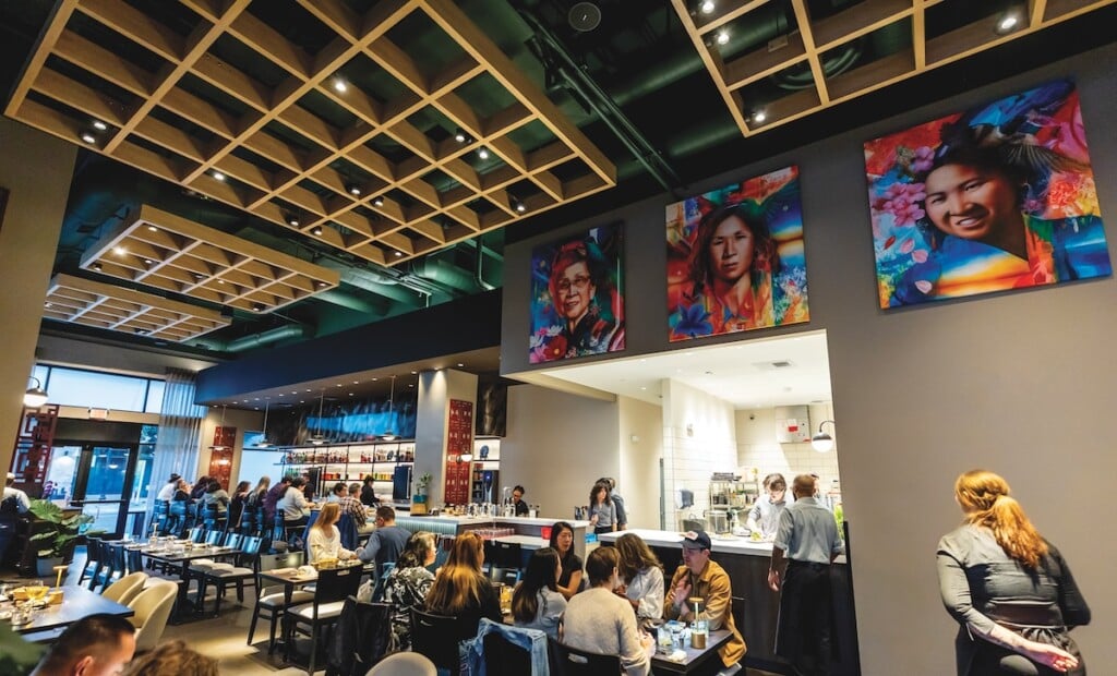 The Chu Mai dining room with a set of portraits showing the mother of chef Billy Ngo