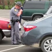 Trooper Taking Plate Numbers