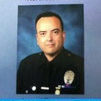 La Cop Shoots Friend