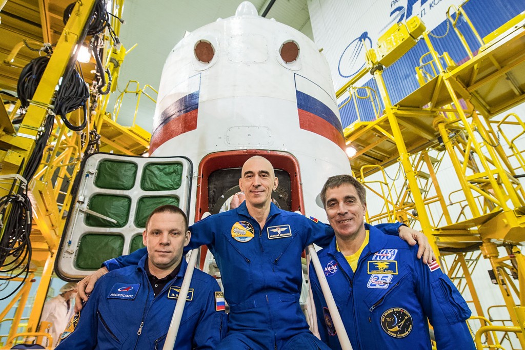 Jsc2020e016986 At The Baikonur Cosmodrome In Kazakhstan, Expedition 63 Crewmembers Ivan Vagner (left) And Anatoly Ivanishin (center) Of Roscosmos And Chris Cassidy (right) Of Nasa Pose For Pictures April 3 In Front Of Their Soyuz Spacecraft As Part Of T