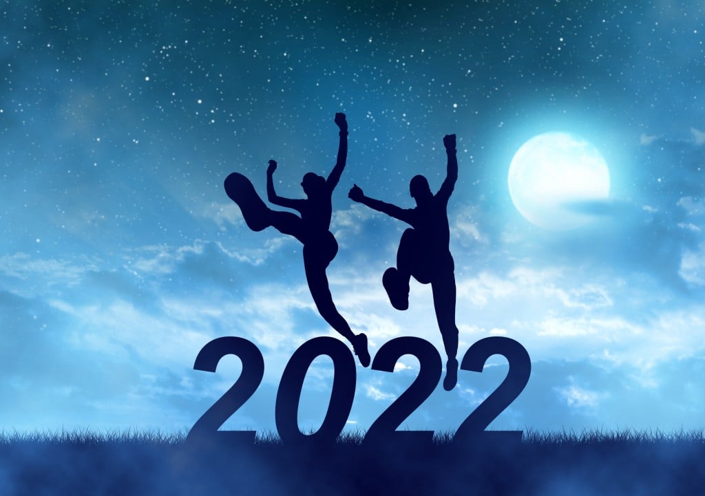 Silhouette The Girls Jump To The New Year 2022 In Night With Full Moon Light.