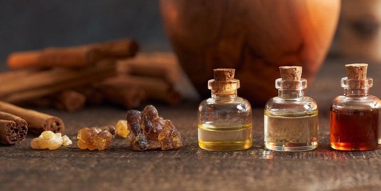 Panoramic Header Of Essential Oil Bottle With Frankincense And Christmas Spices Cinnamon And Star Anise