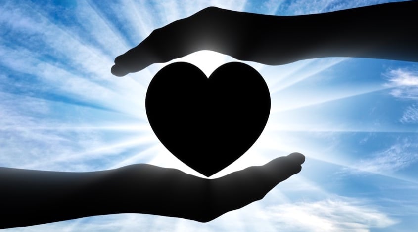 Altruism Concept. Silhouette Of Hands Protecting Heart Symbol