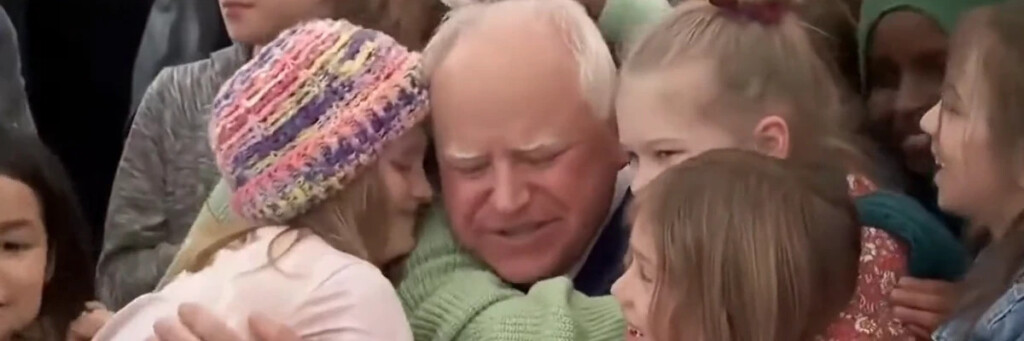 Students Hug Democratic Minnesota Gov Tim Walz After He Signed A Universal Free School Meal Bill Into Law On March 17 2023
