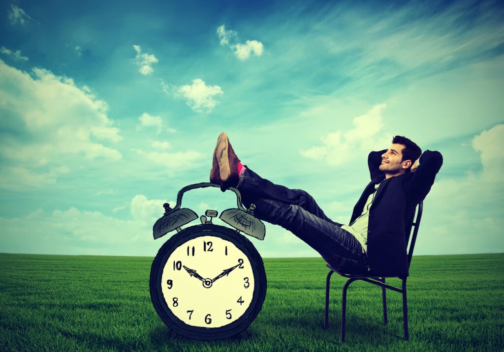 Business Man Relaxing Sitting On A Chair In The Open Air