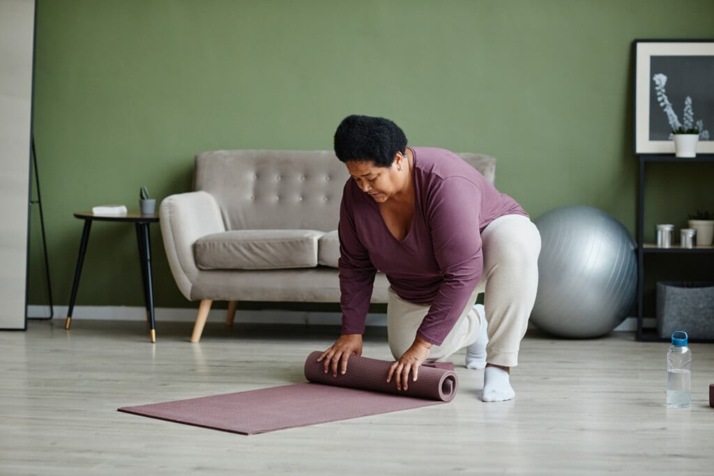 Black Senior Woman At Home Workout